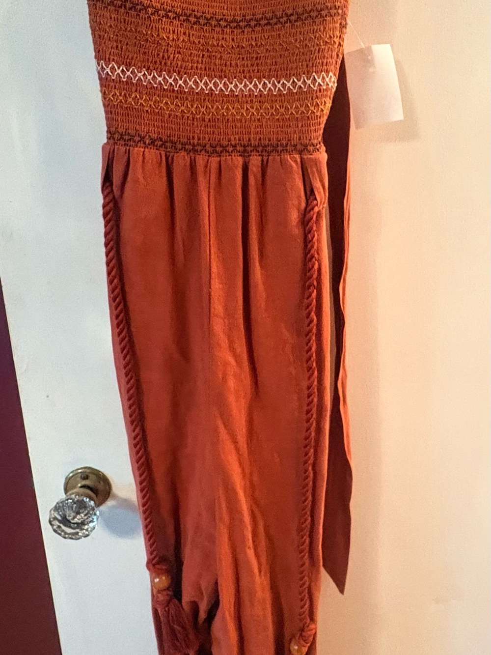 Free People Rust Orange jumpsuit with Tassel Rope Detail